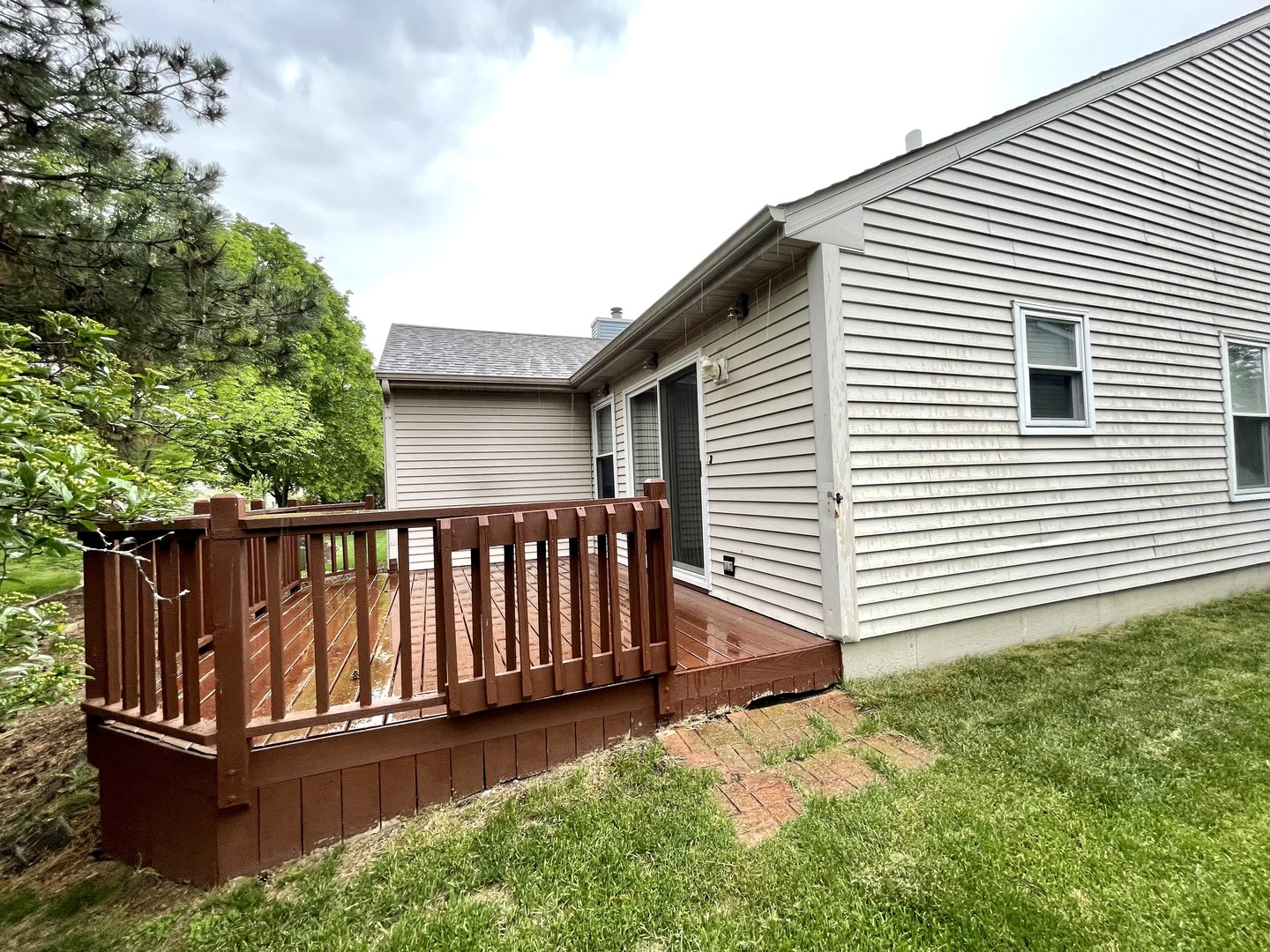 170 Hamlet Circle Montgomery, IL 60538 - Photo 3 of 13 a view of a backyard with wooden fence