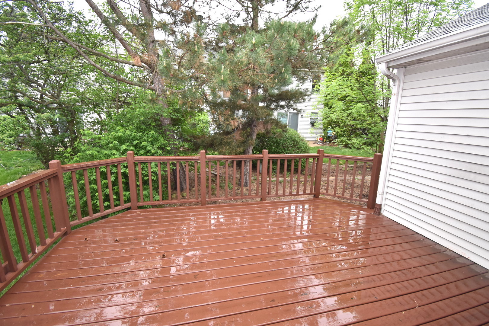 170 Hamlet Circle Montgomery, IL 60538 - Photo 4 of 13 a view of deck with two chairs and wooden floor