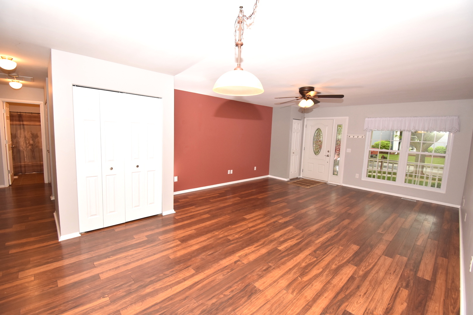 170 Hamlet Circle Montgomery, IL 60538 - Photo 5 of 13 a view of a room with wooden floor
