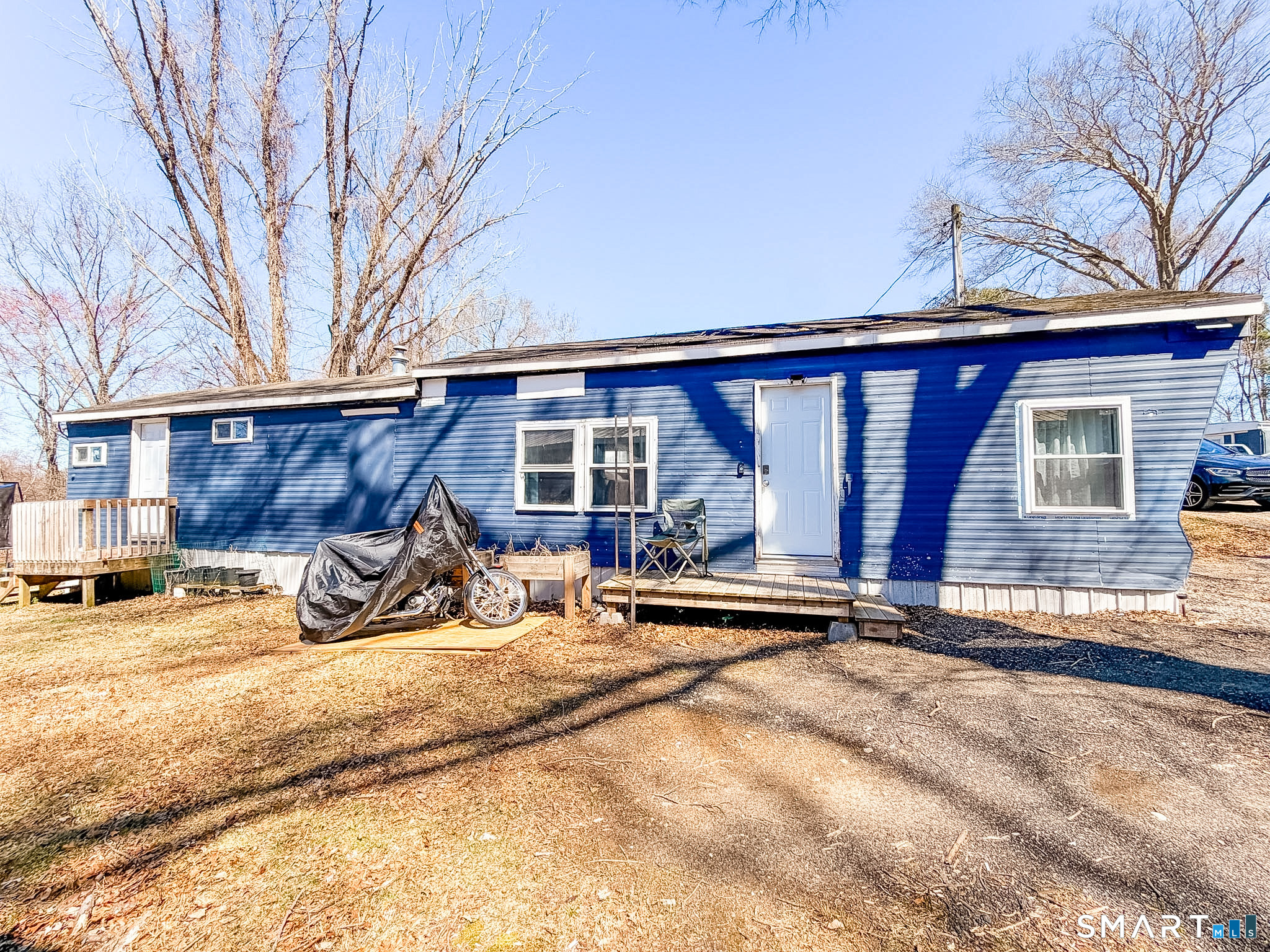 16 Conrad's Park Killingly, CT 06241 - Photo 7 of 12 a view of a house with backyard porch and sitting area