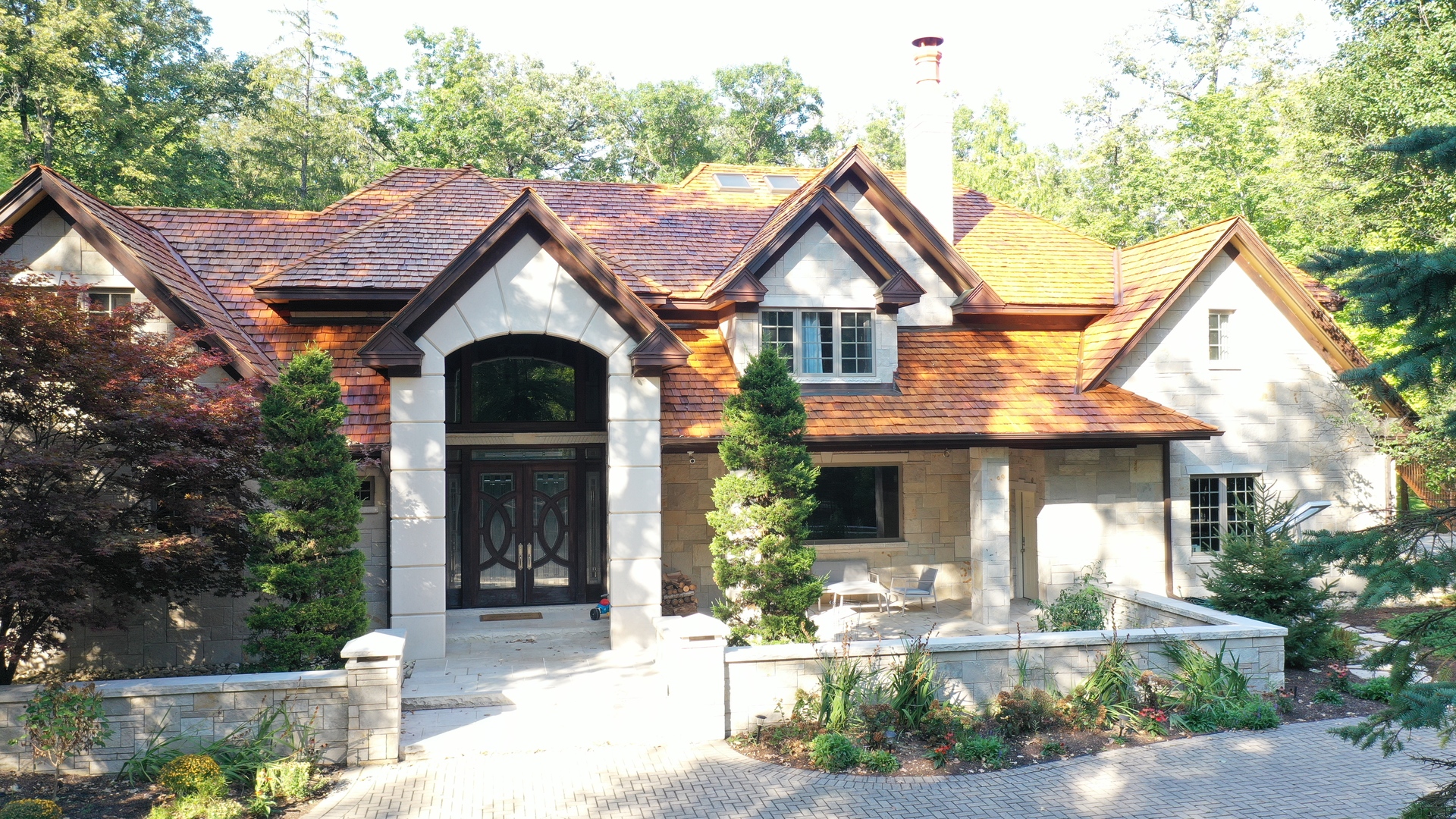 a front view of a house with garden