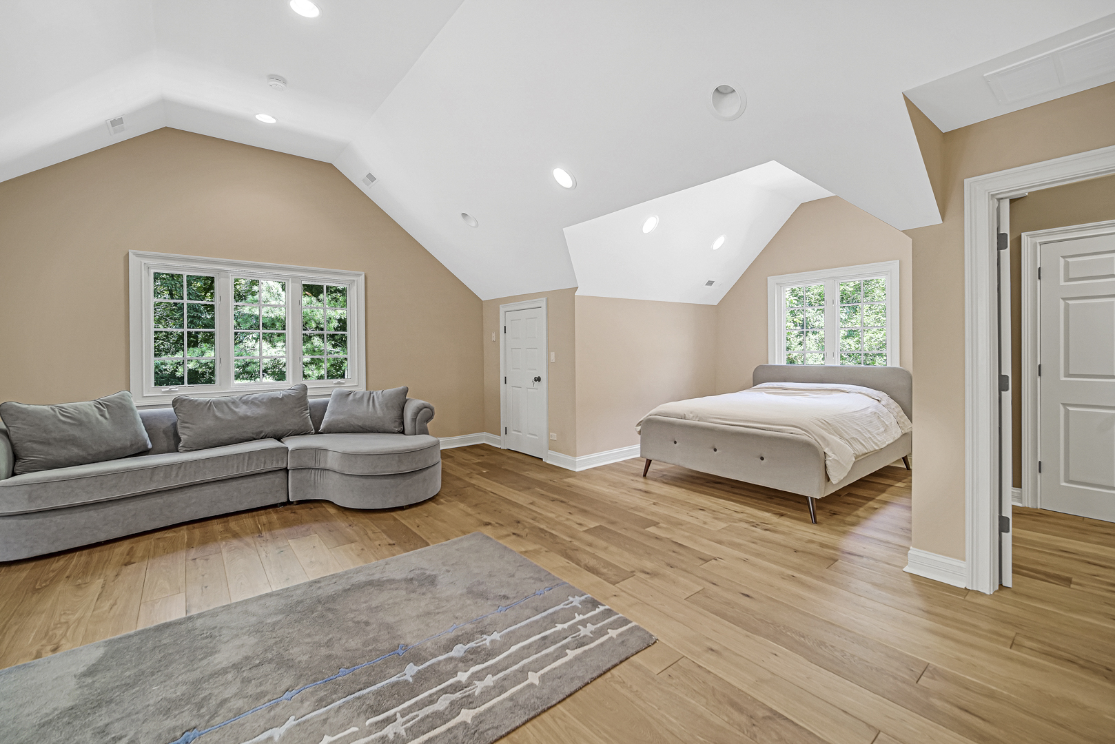 2800 Orange Brace Road Riverwoods, IL 60015 - Photo 20 of 41 a spacious bedroom with a bed and a couch