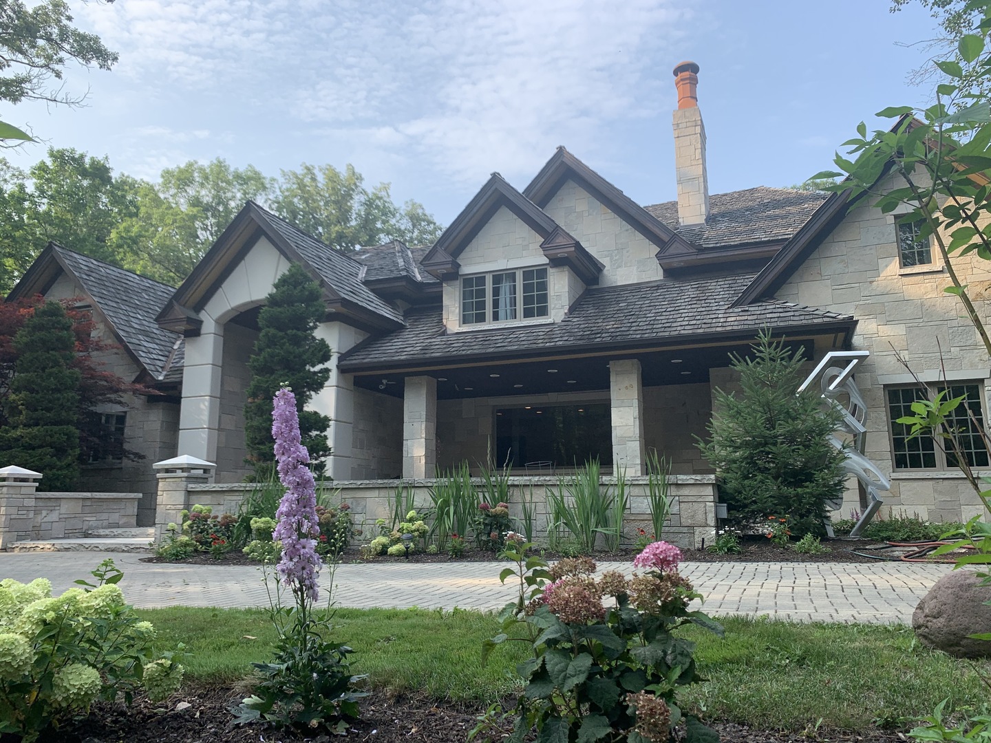 2800 Orange Brace Road Riverwoods, IL 60015 - Photo 3 of 41 a front view of a house with garden