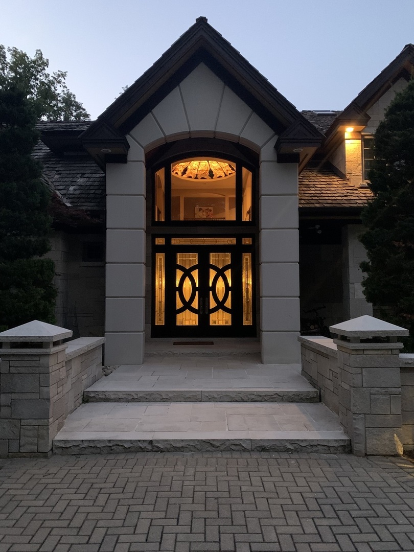2800 Orange Brace Road Riverwoods, IL 60015 - Photo 34 of 41 a front view of a house with a yard