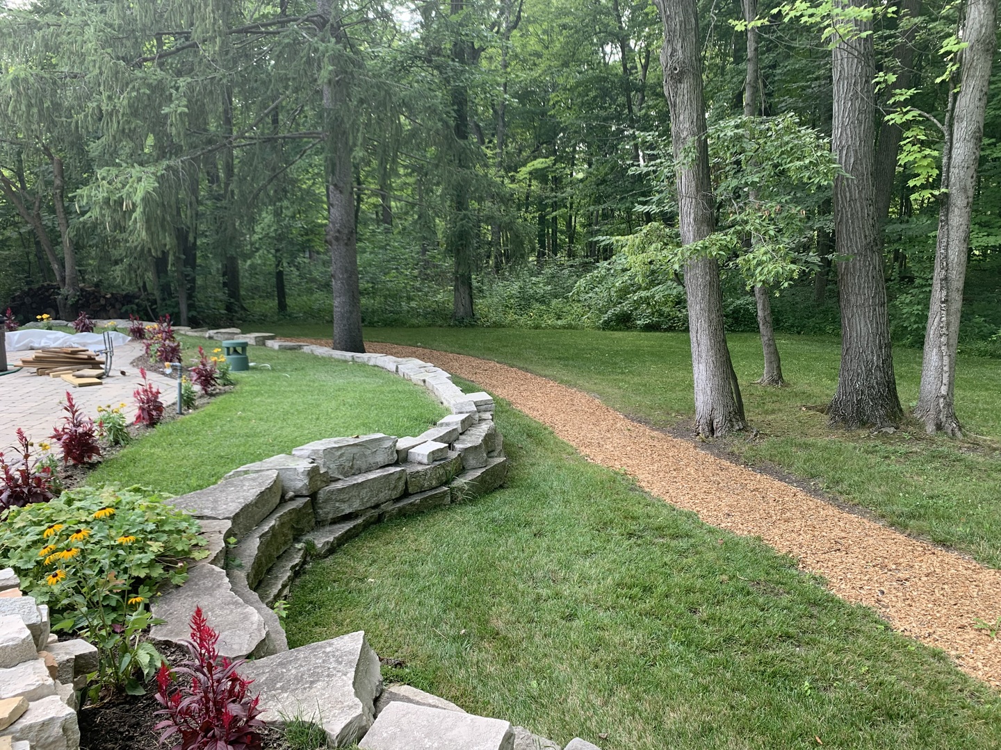 2800 Orange Brace Road Riverwoods, IL 60015 - Photo 38 of 41 a view of a backyard with potted plants and large trees