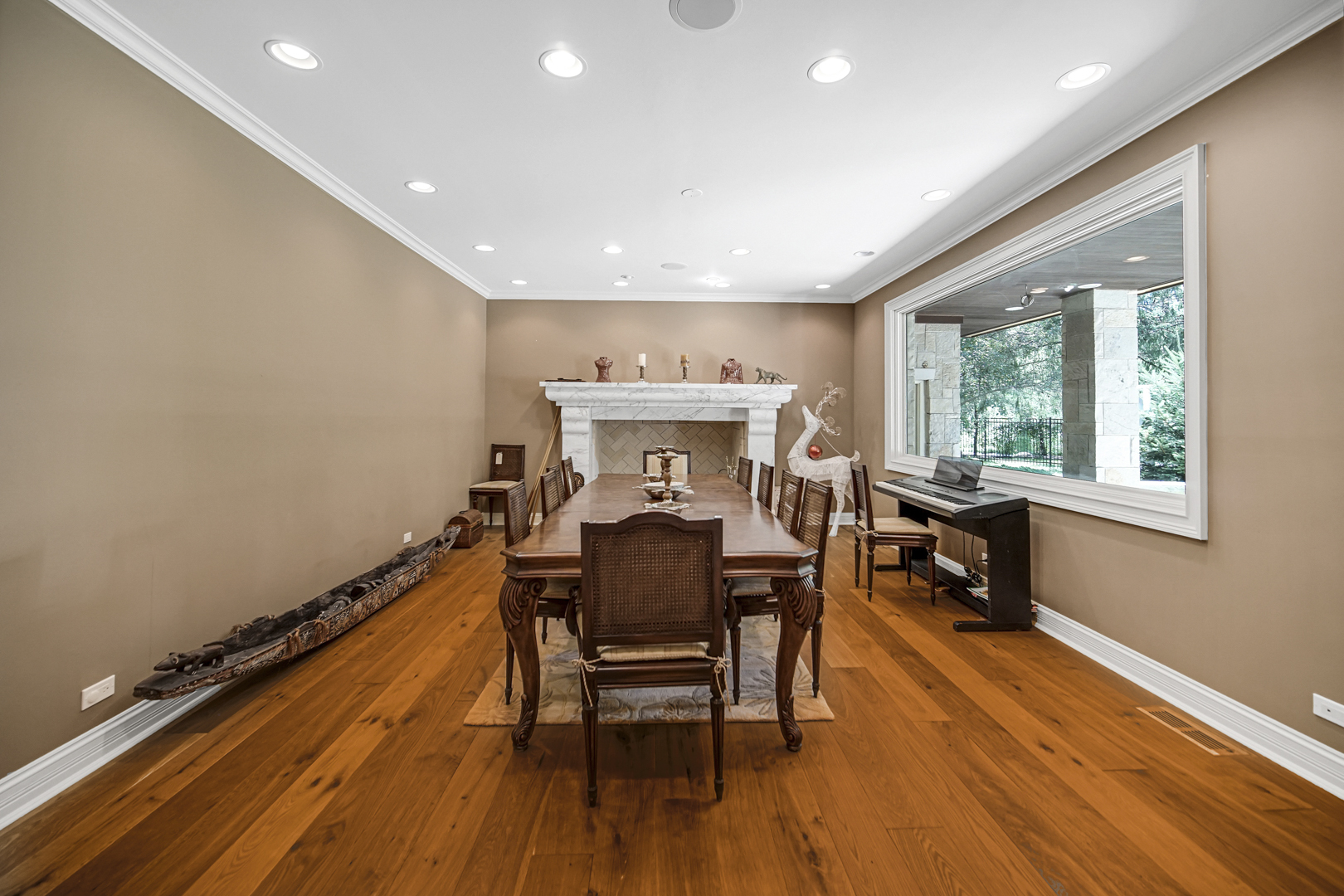 2800 Orange Brace Road Riverwoods, IL 60015 - Photo 5 of 41 a view of a dining room with furniture window and wooden floor
