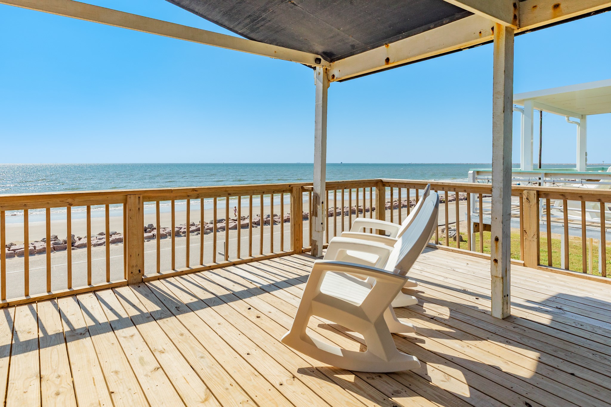 210 Beach Drive Surfside Beach, TX 77541 - Photo 15 of 33 Deck – Corner Viewpoint – Front-row vantage over the shoreline with room for loungers and easy flow to the main deck.