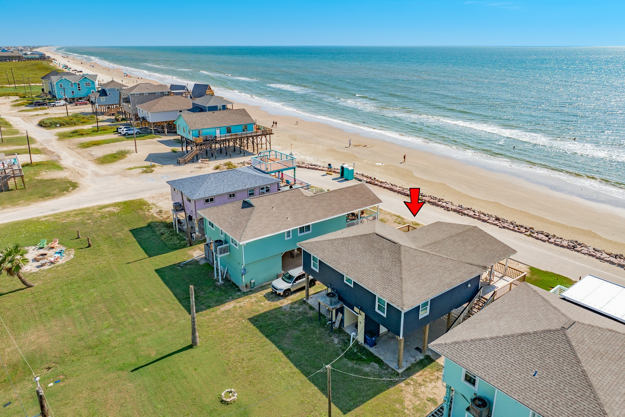 210 Beach Drive Surfside Beach, TX 77541 - Photo 17 of 33 Aerial – Proximity to Water – Steps from the water’s edge with an easy stroll to the sand and expansive Gulf vistas.