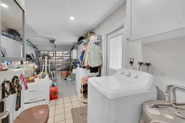 a storage room with washer and dryer