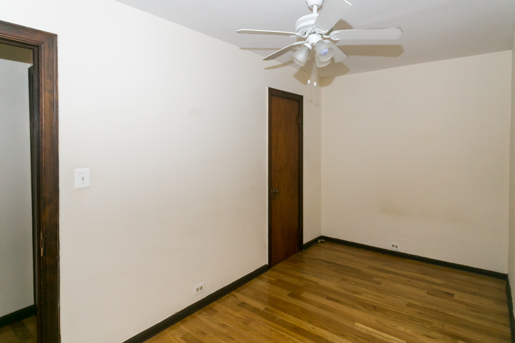 1211 West Elmdale Avenue, Unit 3 Chicago, IL 60660 - Photo 14 of 16 a view of empty room with wooden floor