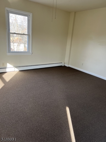 1483 Union Valley Road West Milford, NJ 07480 - Photo 6 of 7 an empty room with a window