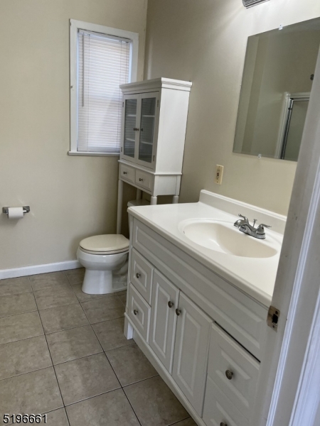 1483 Union Valley Road West Milford, NJ 07480 - Photo 7 of 7 a bathroom with a sink toilet and mirror