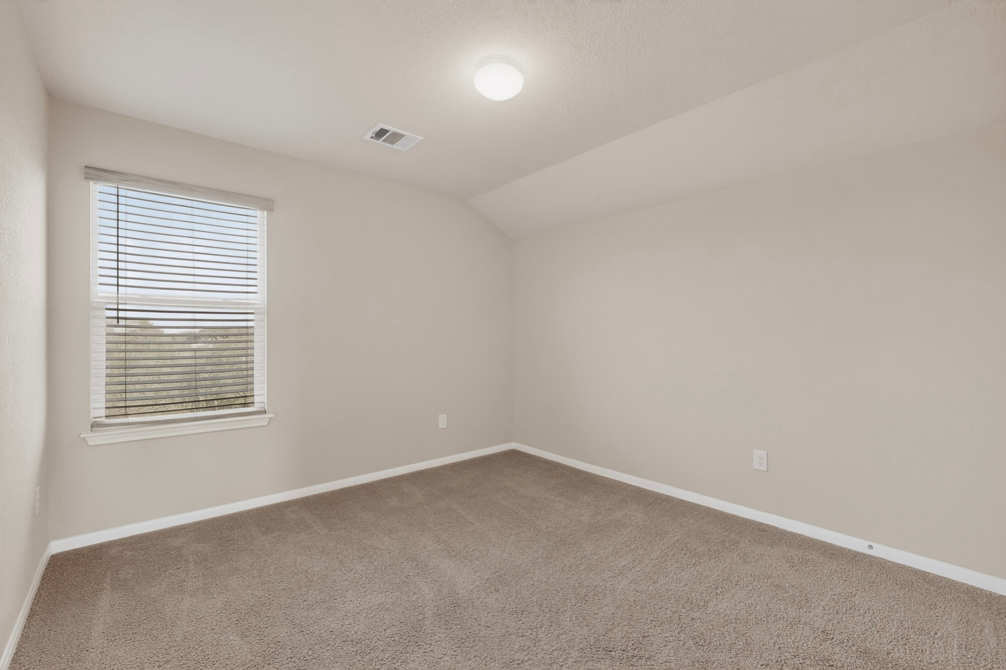 5905 Diamondleaf Bend Austin, TX 78724 - Photo 27 of 38 Carpeted room with a single window featuring horizontal blinds