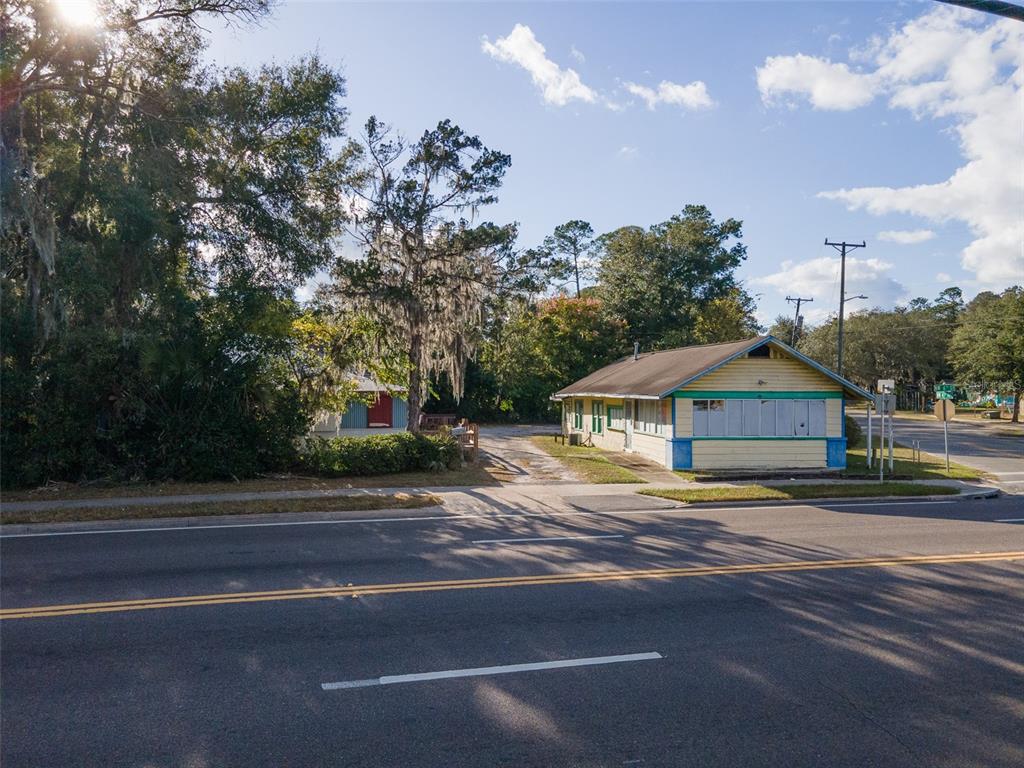 4016 Northwest 6th Street Gainesville, FL 32609 - Photo 18 of 20 a house with trees in the background