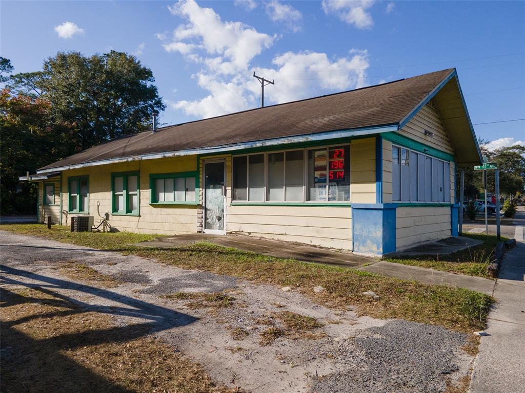 4016 Northwest 6th Street Gainesville, FL 32609 - Photo 5 of 20 a front view of a house with a yard