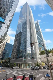 a view of a city with tall buildings