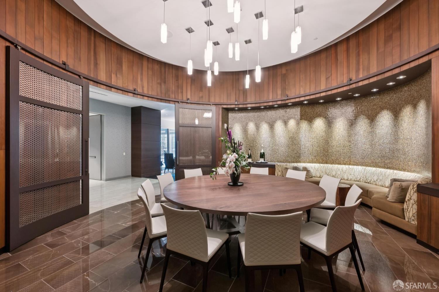301 Mission Street, Unit 35C San Francisco, CA 94105 - Photo 23 of 28 a view of a dining room with furniture
