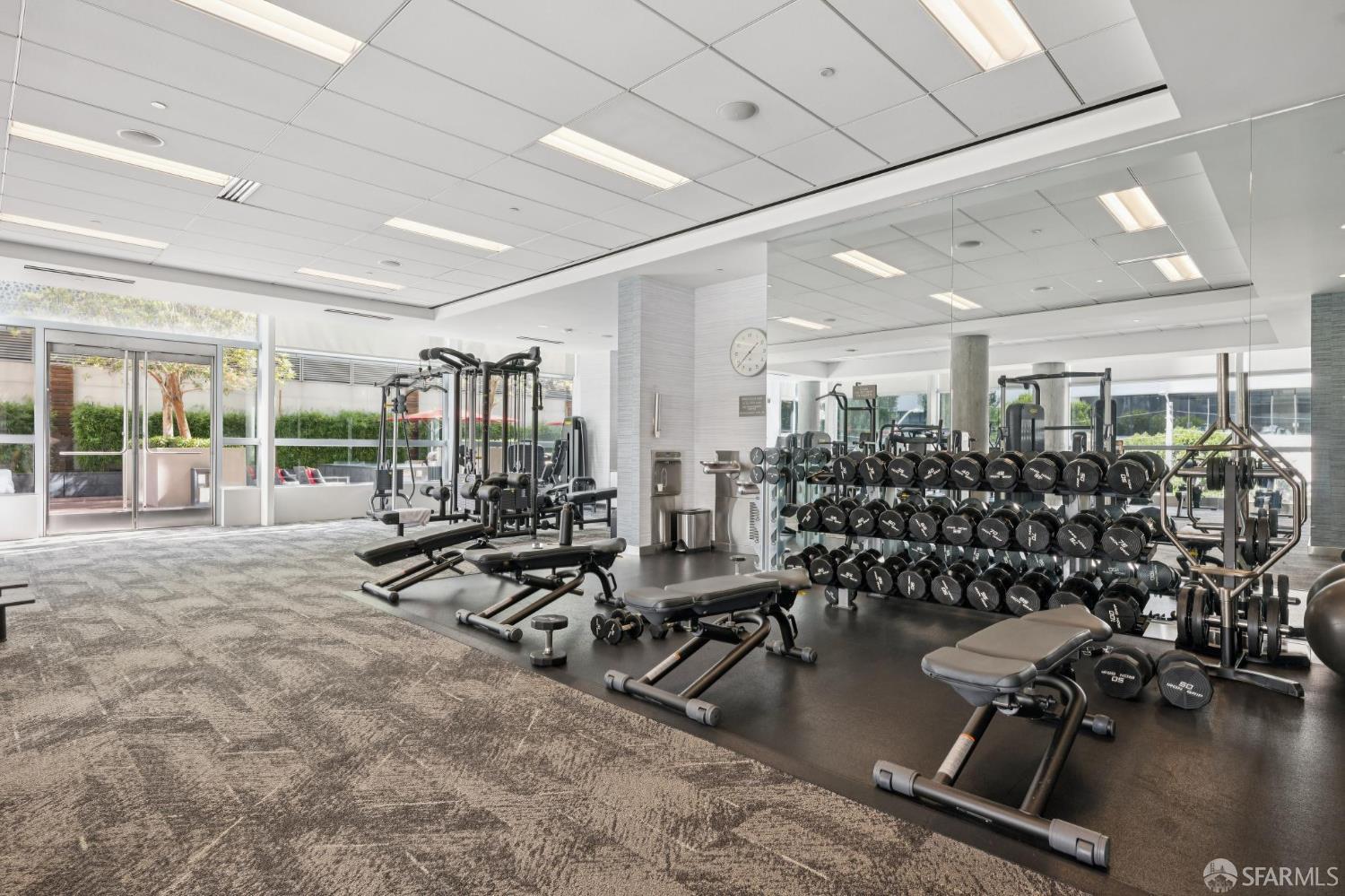 301 Mission Street, Unit 35C San Francisco, CA 94105 - Photo 25 of 28 a view of a room with gym equipment