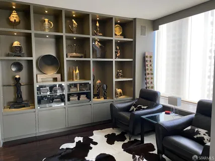 a workspace with furniture and window