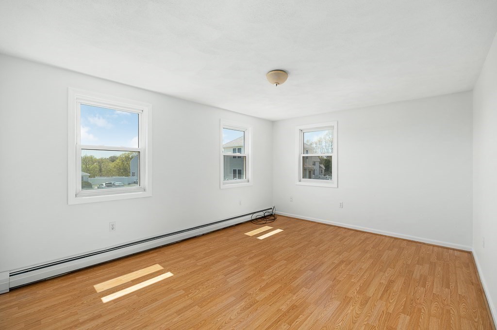 12 Crestview Terrace Gloucester, MA 01930 - Photo 15 of 27 a view of a room with wooden floor and window