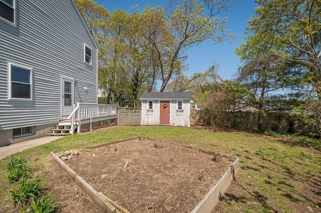 12 Crestview Terrace Gloucester, MA 01930 - Photo 23 of 27 a view of a house with a yard and garage