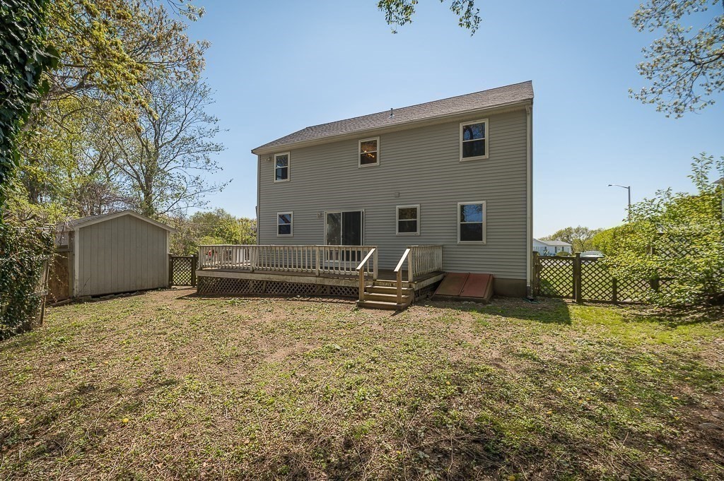 12 Crestview Terrace Gloucester, MA 01930 - Photo 27 of 27 a backyard of a house with seating space