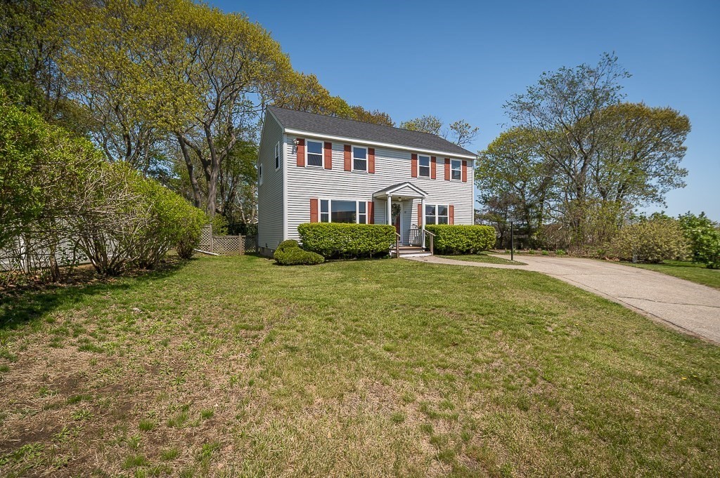 12 Crestview Terrace Gloucester, MA 01930 - Photo 3 of 27 a front view of a house with a yard