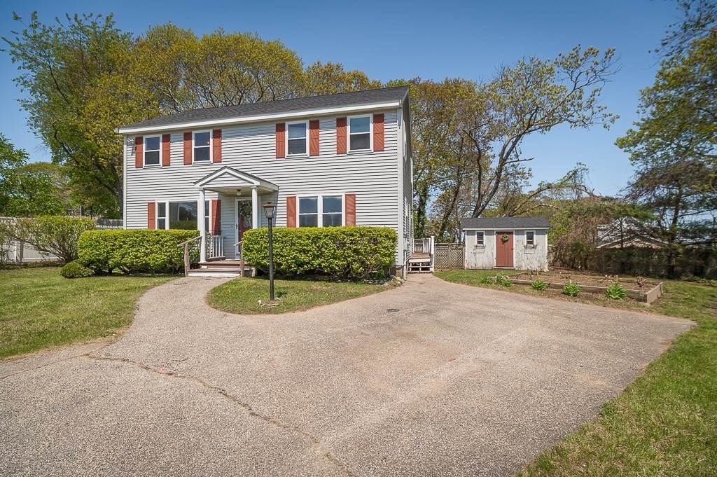 12 Crestview Terrace Gloucester, MA 01930 - Photo 4 of 27 front view of a house with a yard