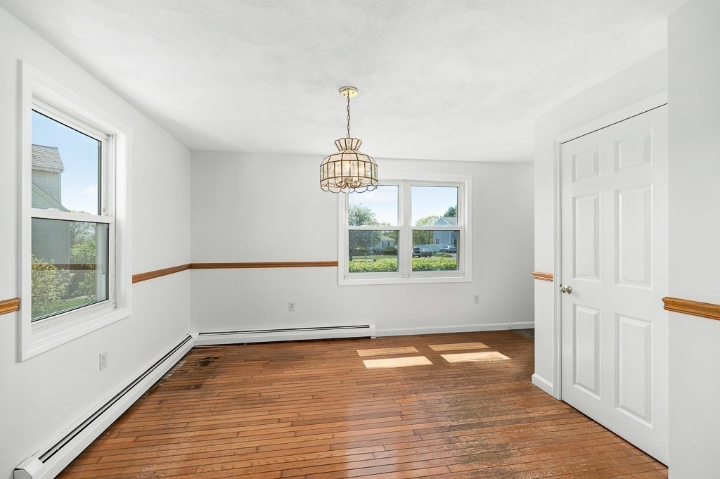 12 Crestview Terrace Gloucester, MA 01930 - Photo 10 of 27 a view of empty room with wooden floor and fan