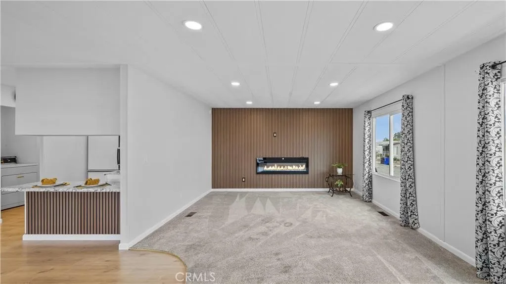 1400 13th, Unit 206 Upland, CA 91786 - Photo 7 of 28 Electrical fireplace in living room