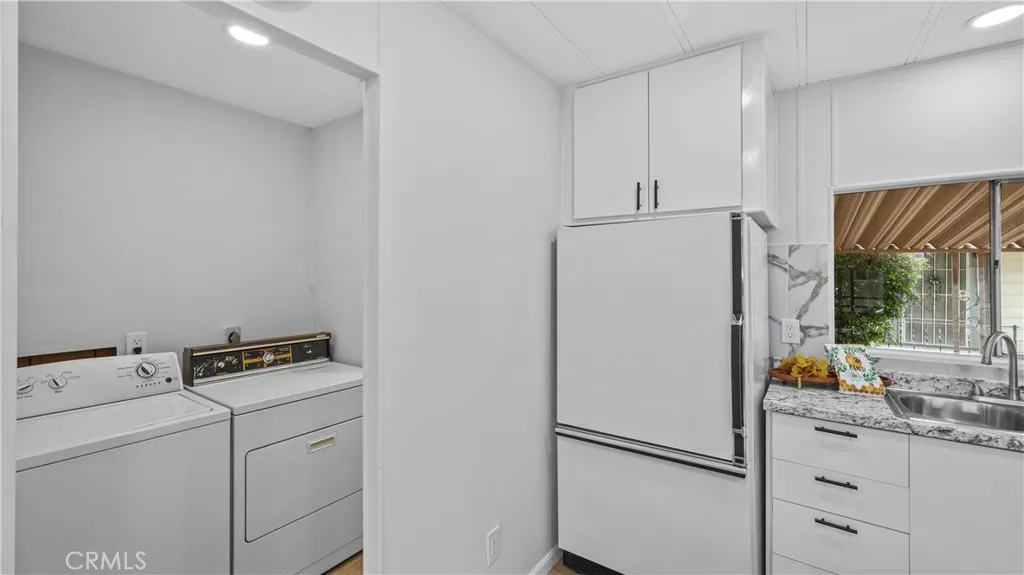 1400 13th, Unit 206 Upland, CA 91786 - Photo 10 of 28 Laundry entrance from kitchen
