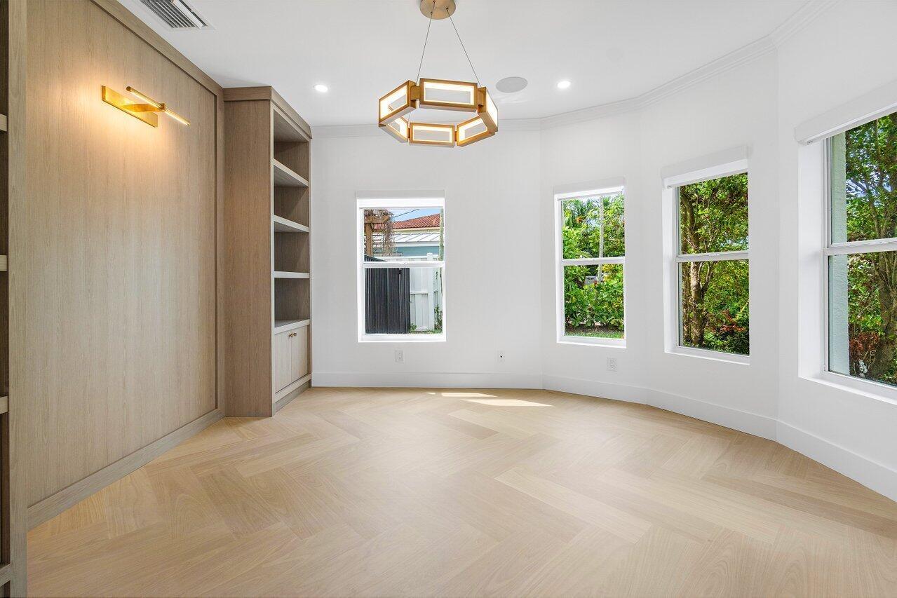 1366 Southwest 4th Court Boca Raton, FL 33432 - Photo 6 of 43 a view of an empty room with a window
