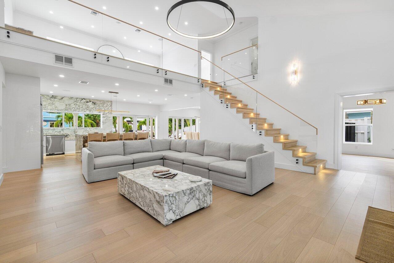 1366 Southwest 4th Court Boca Raton, FL 33432 - Photo 8 of 43 a living room with furniture and wooden floor