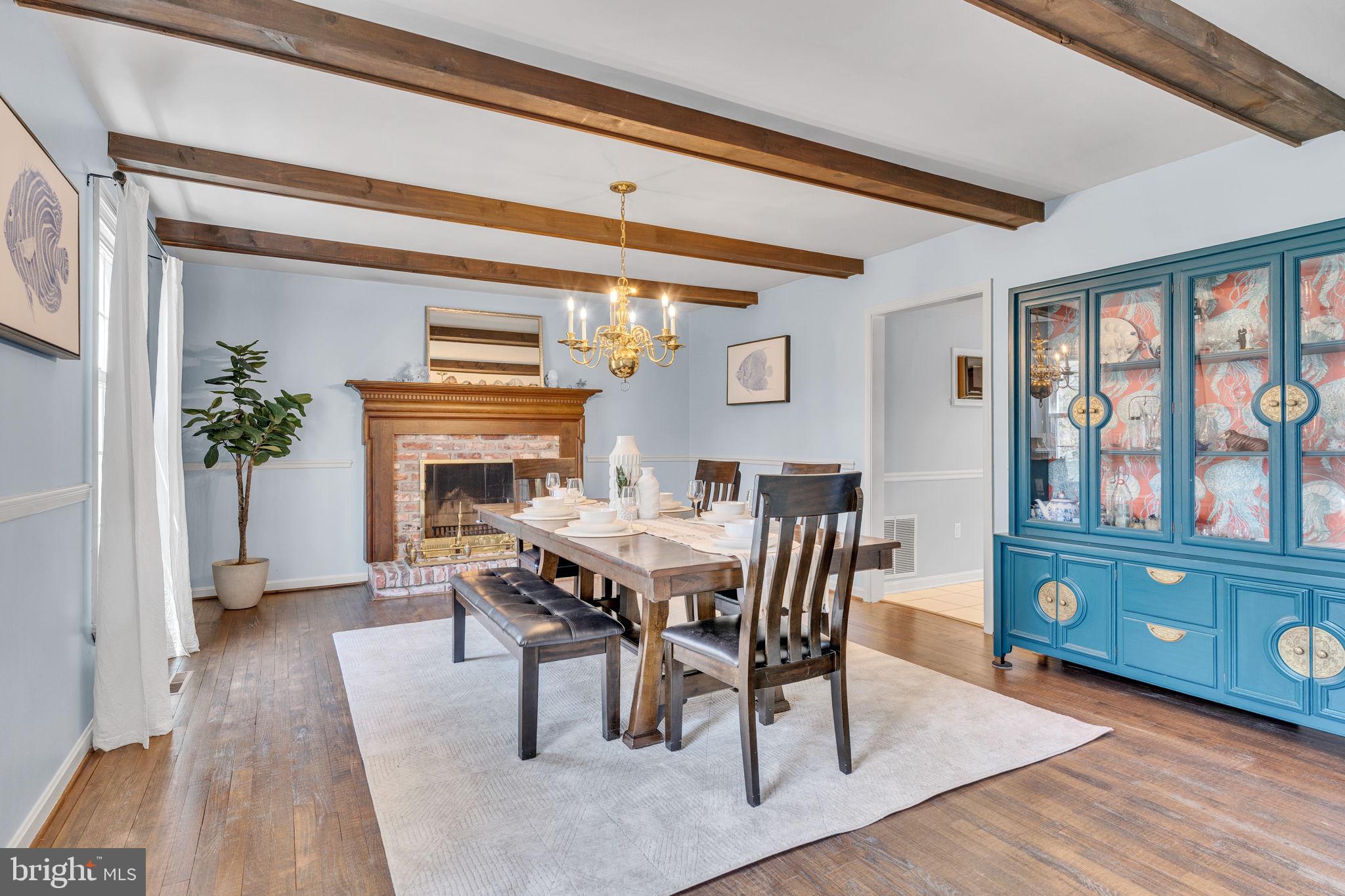 10231 3 Doctors Road Dunkirk, MD 20754 - Photo 11 of 63 a view of a dining room with furniture window and wooden floor