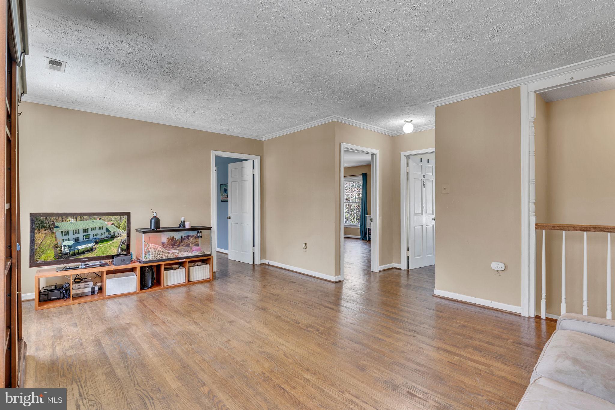 10231 3 Doctors Road Dunkirk, MD 20754 - Photo 23 of 63 a view of a livingroom with furniture and window