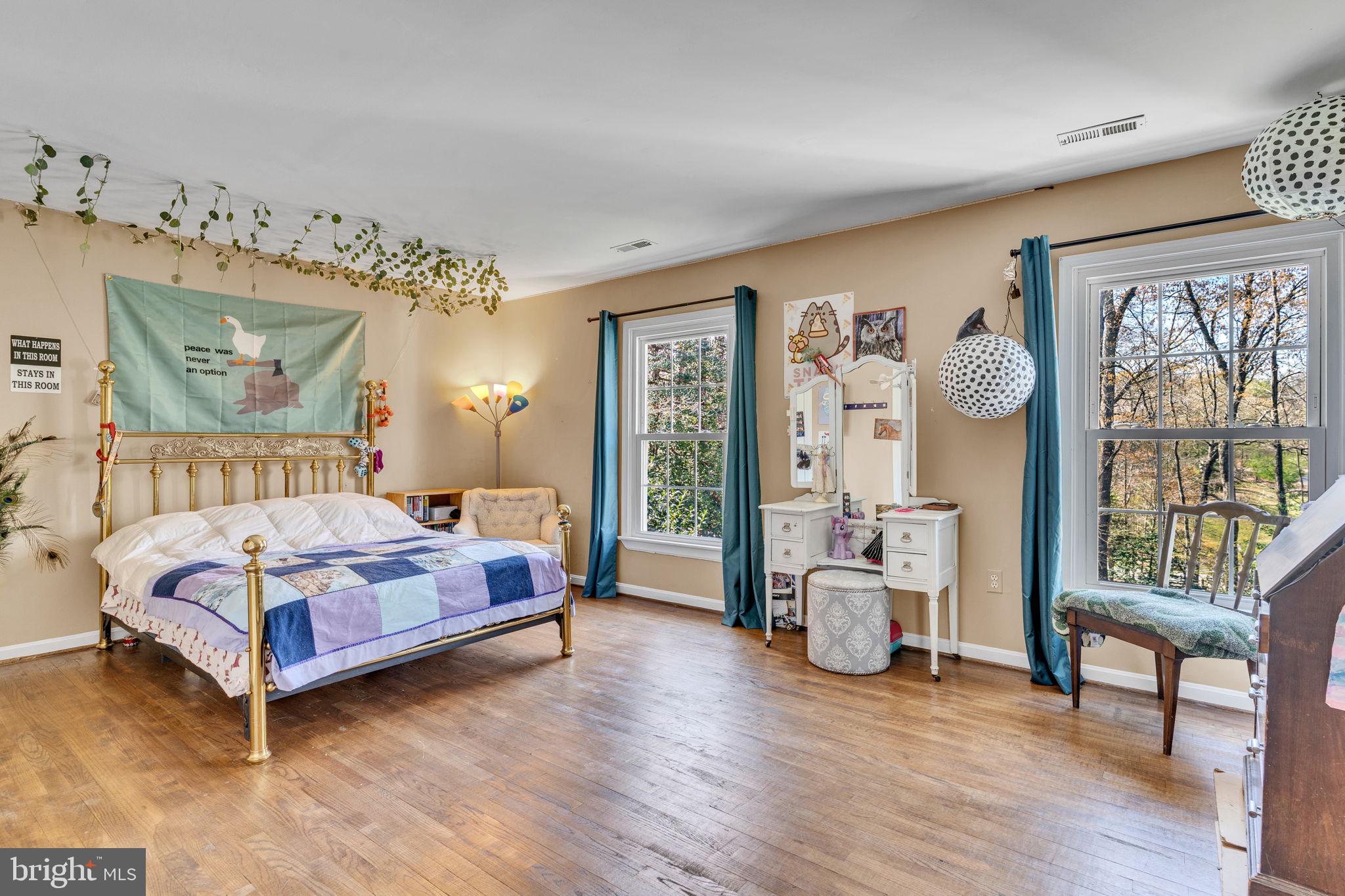 10231 3 Doctors Road Dunkirk, MD 20754 - Photo 29 of 63 a bedroom with a large bed and a window