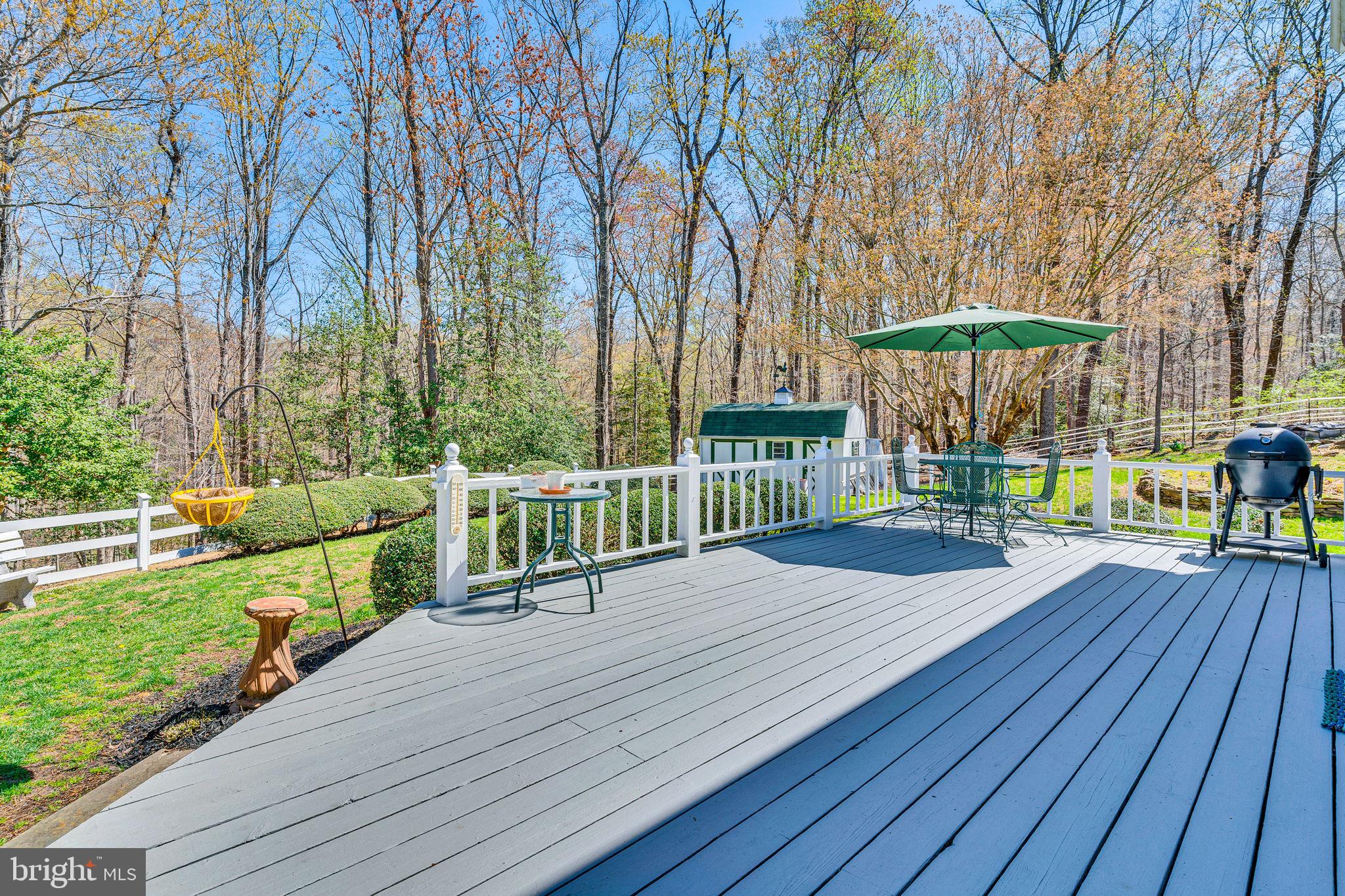 10231 3 Doctors Road Dunkirk, MD 20754 - Photo 39 of 63 a view of a deck with a yard
