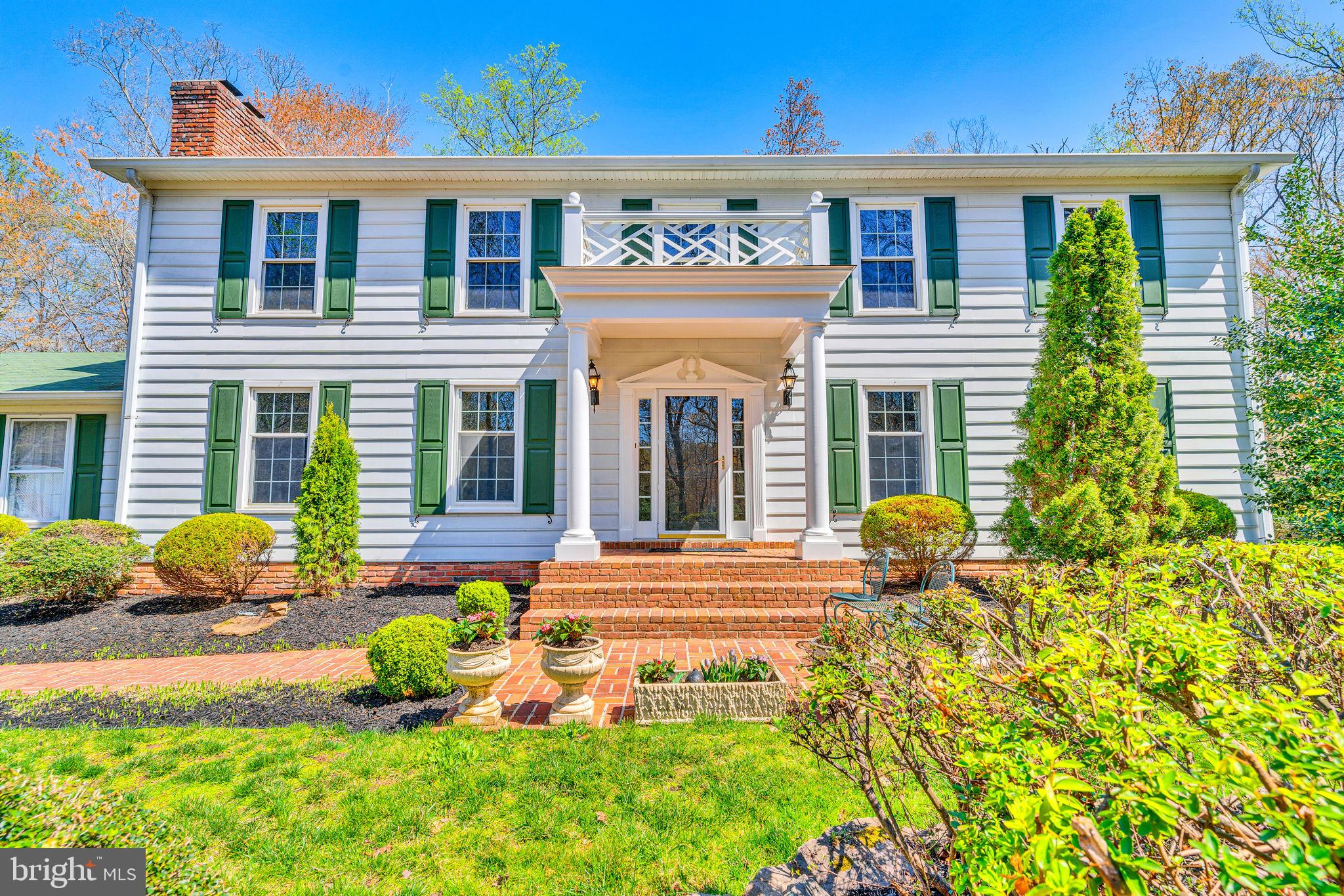 10231 3 Doctors Road Dunkirk, MD 20754 - Photo 58 of 63 front view of a house with a patio