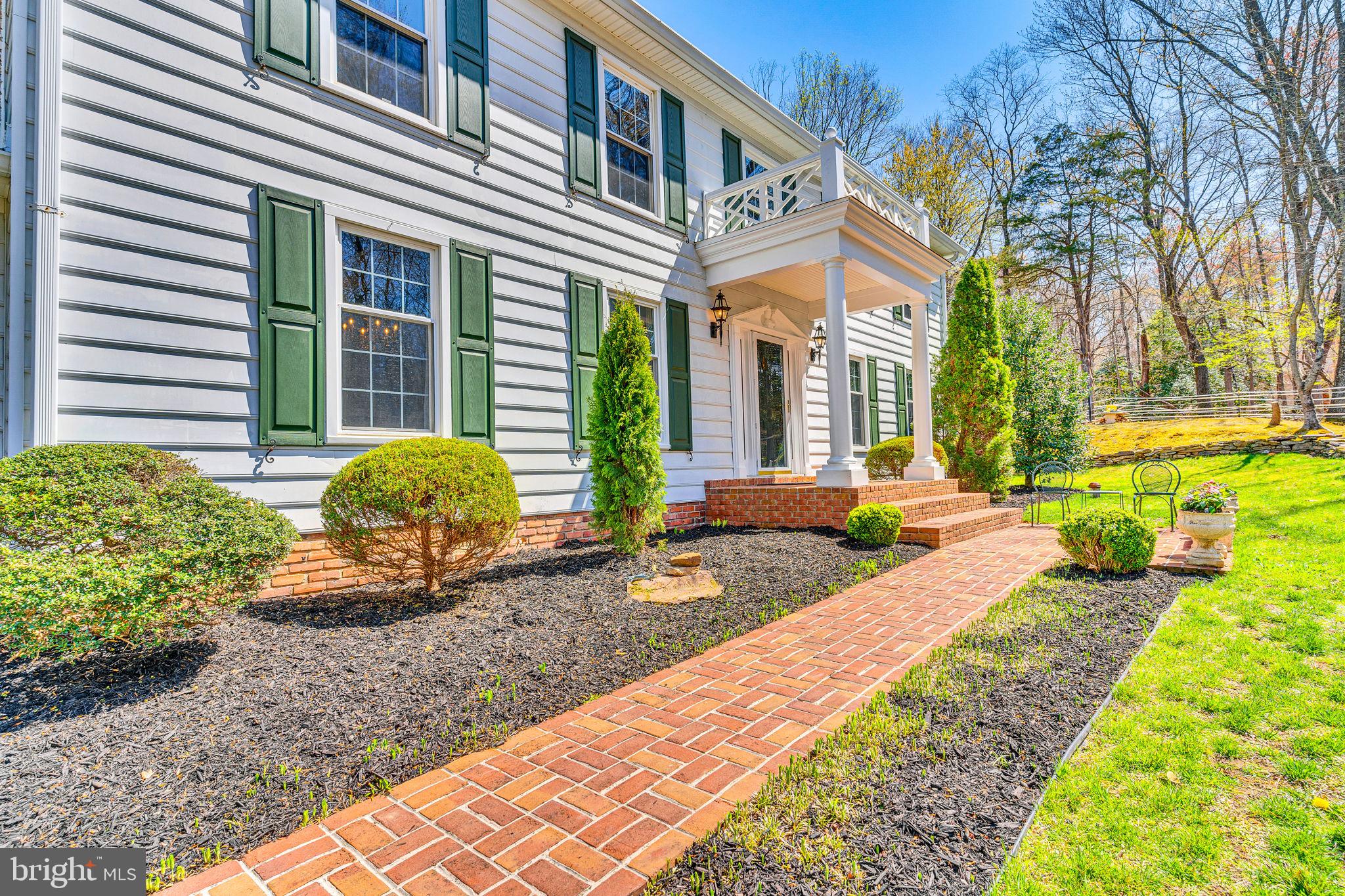 10231 3 Doctors Road Dunkirk, MD 20754 - Photo 8 of 63 a view of a house with backyard and sitting area
