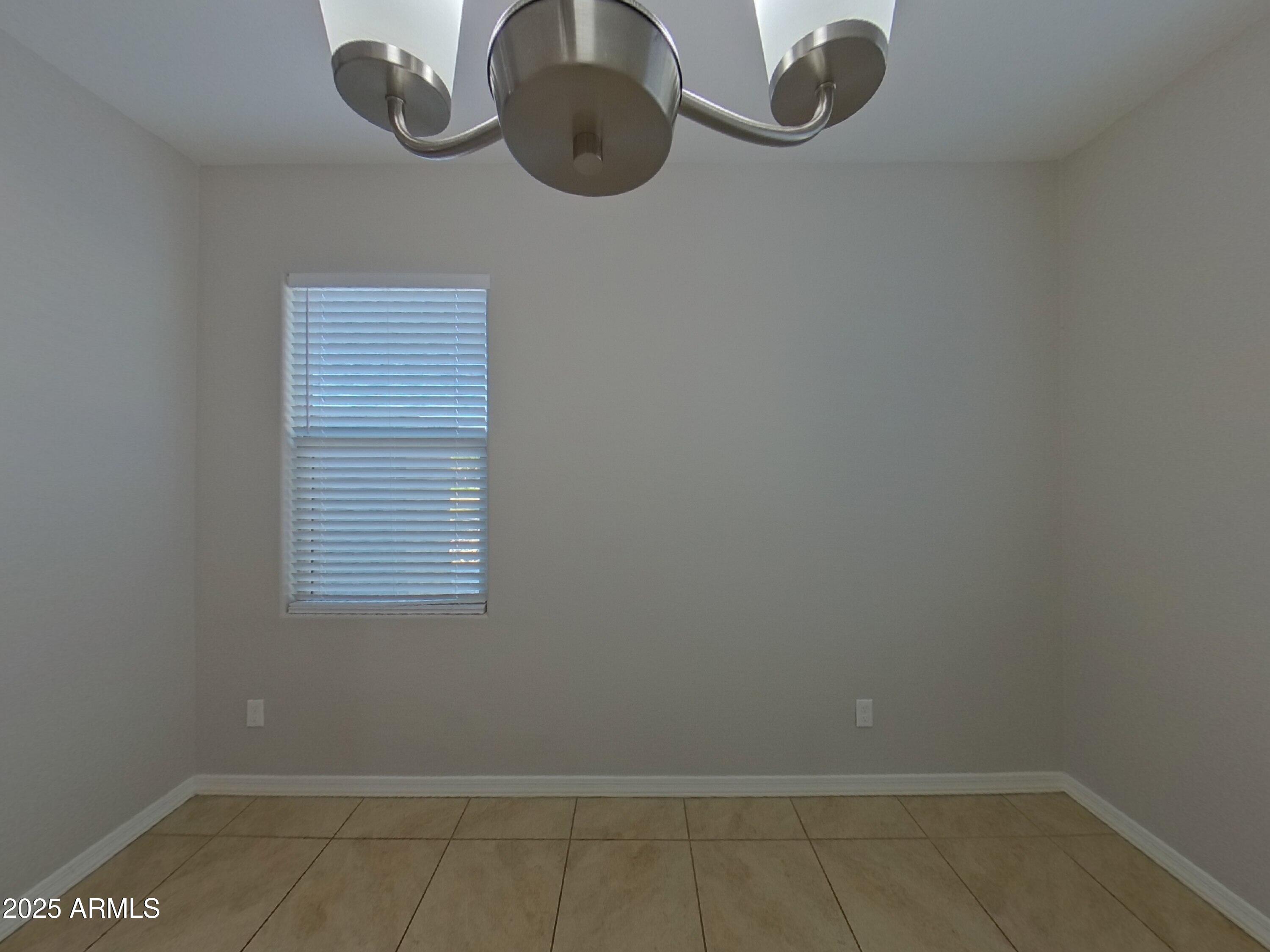 40209 Walker Way Maricopa, AZ 85138 - Photo 3 of 16 an empty room with closet