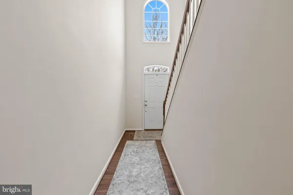 a kitchen with stainless steel appliances granite countertop refrigerator a stove top oven a sink and dishwasher