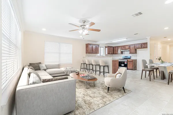 a living room with furniture and a table