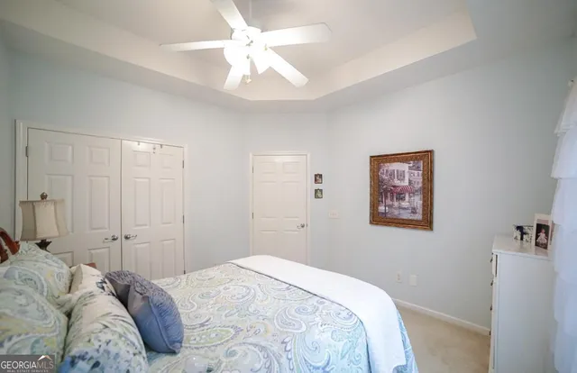 a bathroom with a toilet sink and a shower