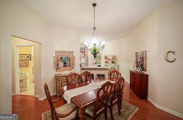 a view of a dining room with furniture