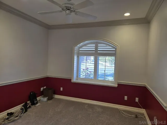 an empty room that has a window