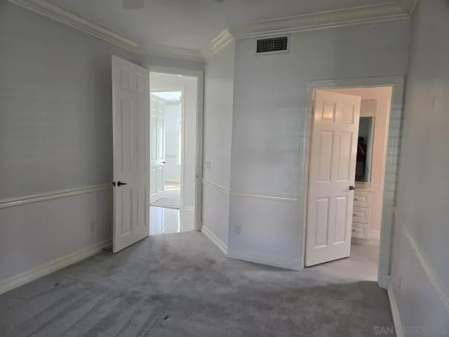 a view of a room that has a window in it