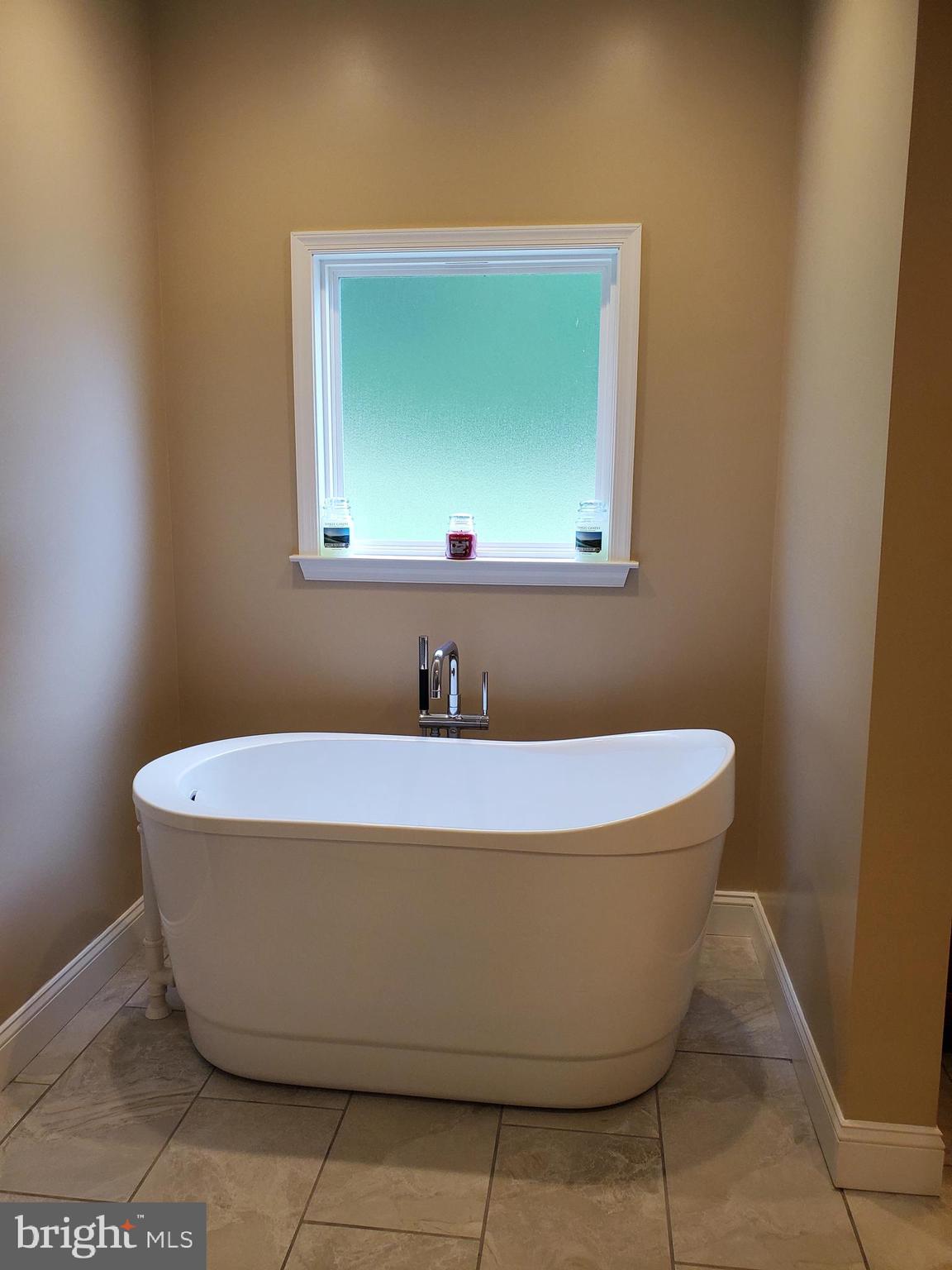 7520 Broomes Island Road St. Leonard, MD 20685 - Photo 18 of 35 Master bath with separate tub ceramic tile floors