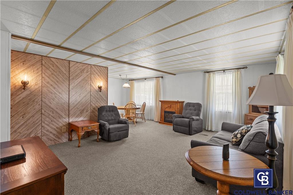 437 Blue Jay Lane Apollo, PA 15613 - Photo 17 of 30 a living room with furniture and a lamp