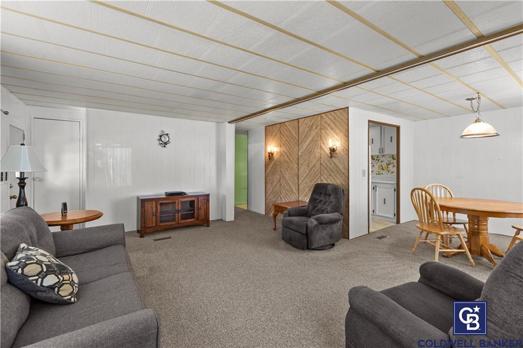 437 Blue Jay Lane Apollo, PA 15613 - Photo 18 of 30 a living room with furniture and a flat screen tv