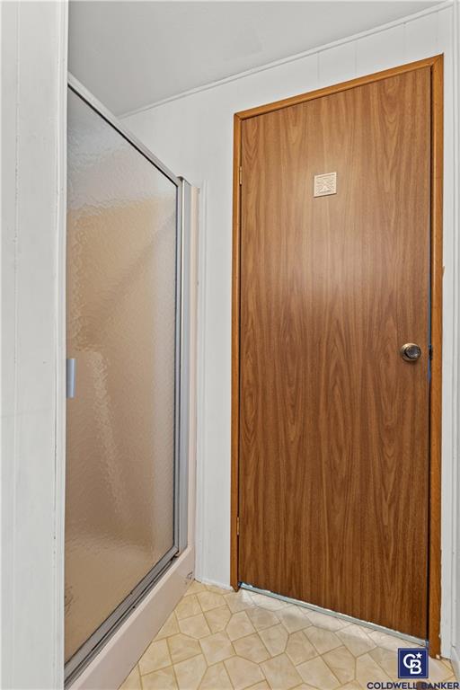 437 Blue Jay Lane Apollo, PA 15613 - Photo 22 of 30 a bathroom with a shower and a glass door